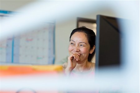 Senior woman using computer Photographie de stock - Premium Libres de Droits, Code: 614-07240179