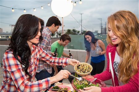 spoon bowl adult - Young adult friends enjoying food at barbeque Stock Photo - Premium Royalty-Free, Code: 614-07240195