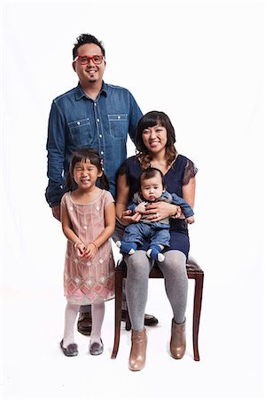 Family portrait of mid adult couple with daughter and baby boy Foto de stock - Sin royalties Premium, Código: 614-07444074