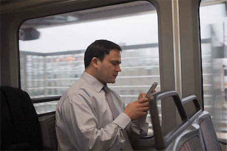 Businessman commuting to work Foto de stock - Sin royalties Premium, Código: 614-07444179