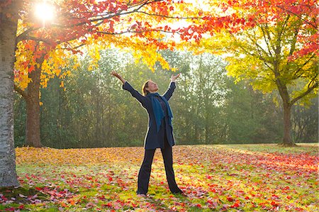 forest woman - Woman stretching in forest Stock Photo - Premium Royalty-Free, Code: 614-07443932