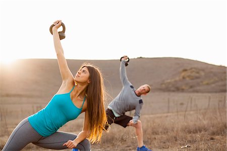 simsearch:614-07487130,k - Couple working out with weights Stock Photo - Premium Royalty-Free, Code: 614-07487131