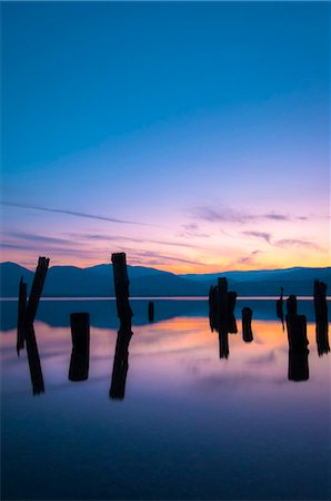 simsearch:614-07487156,k - Old wooden dock stilts in Okanagan Lake, Naramata, British Columbia, Canada Stock Photo - Premium Royalty-Free, Code: 614-07487154