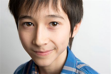 preteen boy smile - Portrait of boy Stock Photo - Premium Royalty-Free, Code: 614-07587544