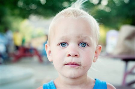 Close up portrait of blue eyed male toddler Stock Photo - Premium Royalty-Free, Code: 614-07587558