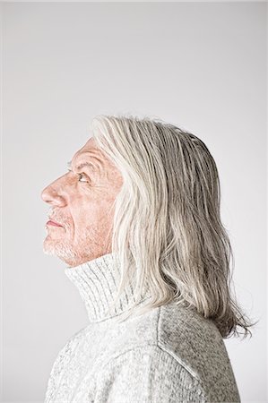 Portrait of mature man, side view, looking up Stock Photo - Premium Royalty-Free, Code: 614-07587604