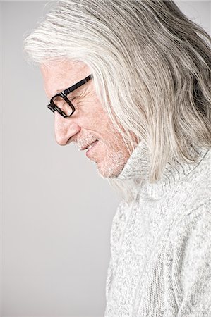 experienced man - Portrait of mature man, side view, looking down Stock Photo - Premium Royalty-Free, Code: 614-07587605