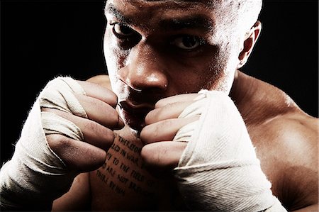 simsearch:614-07652410,k - Mid adult man boxing, close up Stock Photo - Premium Royalty-Free, Code: 614-07652409