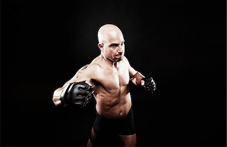 simsearch:614-07652420,k - Mature man punching Stock Photo - Premium Royalty-Free, Code: 614-07652416