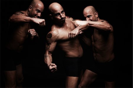 Mature man fighting, composite image Photographie de stock - Premium Libres de Droits, Code: 614-07652421