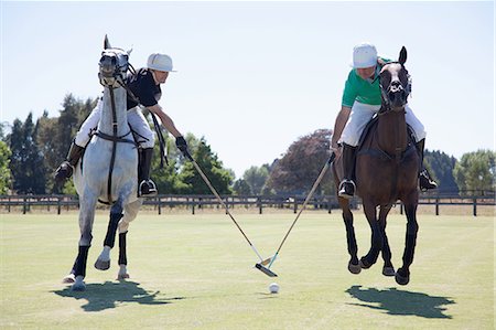 rivais - Two adult men playing polo Foto de stock - Royalty Free Premium, Número: 614-07708241