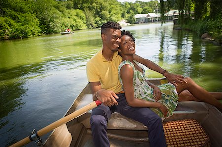 Young couple on rowing lake in Central Park, New York City, USA Stock Photo - Premium Royalty-Free, Code: 614-07735389