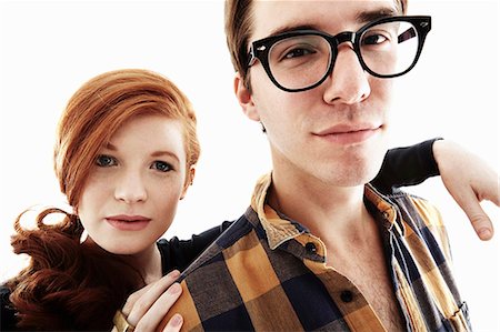 portrait studio white tshirt - Studio portrait of cool young couple Foto de stock - Sin royalties Premium, Código: 614-07735534