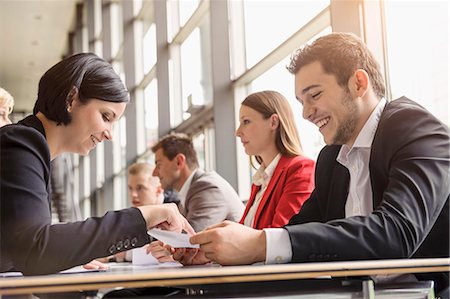 six - Business colleagues sharing ideas at meeting Stock Photo - Premium Royalty-Free, Code: 614-07768127