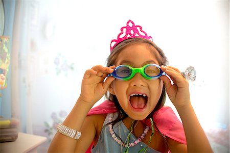 simsearch:614-07806359,k - Young girl wearing fancy dress costume, pulling face Stock Photo - Premium Royalty-Free, Code: 614-07806356