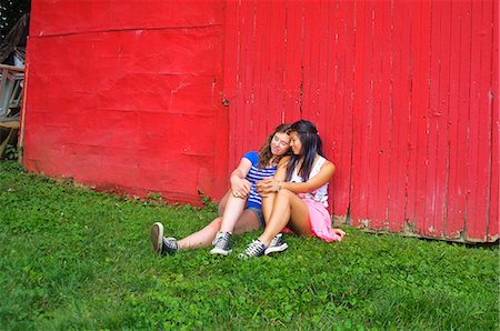 Two teenagers relaxing outdoors Stock Photo - Premium Royalty-Free, Code: 614-07806361