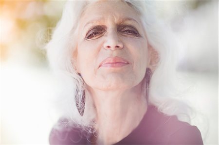 Gray haired woman smiling with confidence Stock Photo - Premium Royalty-Free, Code: 614-07806434