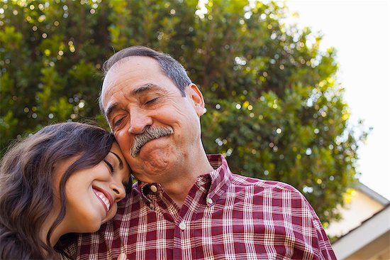 Father and daughter sharing tender moment Photographie de stock - Premium Libres de Droits, Le code de l’image : 614-08000142