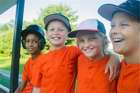 Young baseball players waiting to play Stock Photo - Premium Royalty-Free, Code: 614-08000258