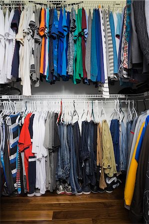 store design - Teenage boys walk in closet in luxury home Stock Photo - Premium Royalty-Free, Code: 614-08000274