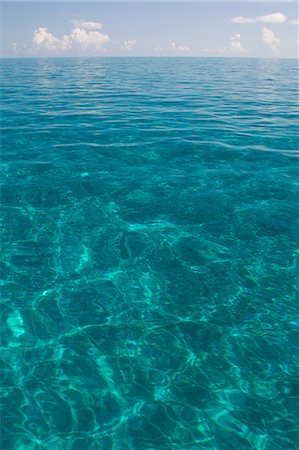 flat (surface) - Calm water on a Summer's day. Stock Photo - Premium Royalty-Free, Code: 614-08000448