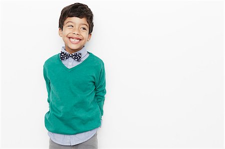 simsearch:614-08030878,k - Boy looking preppy with bow tie Stock Photo - Premium Royalty-Free, Code: 614-08030873