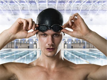 simsearch:649-09206953,k - Male swimmer adjusting swimming goggles Fotografie stock - Premium Royalty-Free, Codice: 614-08031126