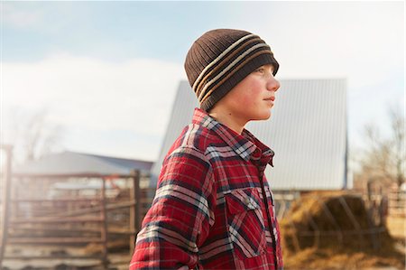 simsearch:614-08065938,k - Portrait of boy wearing knit hat in dairy farm yard Stock Photo - Premium Royalty-Free, Code: 614-08065931