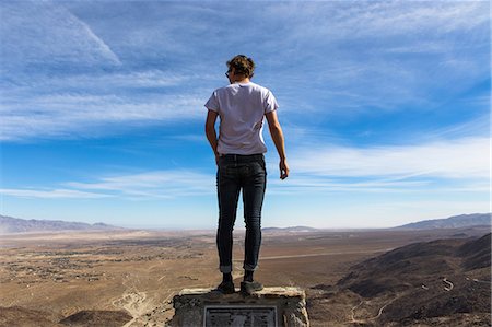 simsearch:614-06973887,k - Rear view of young man looking out over landscape, Anza-Borrego Desert State Park, California, USA Stock Photo - Premium Royalty-Free, Code: 614-08081224