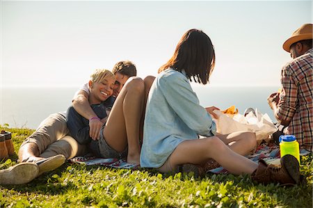 simsearch:614-08081310,k - Group of friends relaxing on grass Photographie de stock - Premium Libres de Droits, Code: 614-08081307