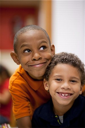 simsearch:614-08081400,k - Boys smiling in classroom Stock Photo - Premium Royalty-Free, Code: 614-08081405