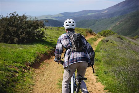 single man travel usa - Cyclist mountain biking, San Luis Obispo, California, United States of America Stock Photo - Premium Royalty-Free, Code: 614-08119519