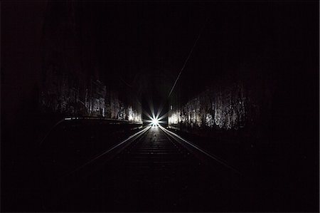 dangerous journey - Train in dark tunnel Stock Photo - Premium Royalty-Free, Code: 614-08119756