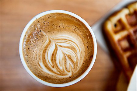 Still life with cappuccino and waffle Stock Photo - Premium Royalty-Free, Code: 614-08126636