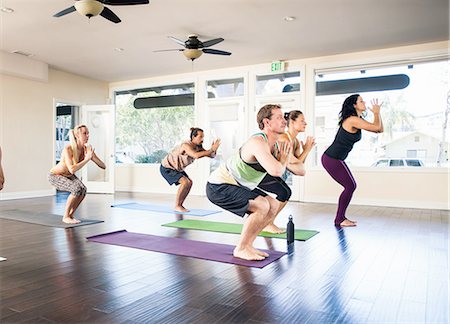 Five people in yoga class Stock Photo - Premium Royalty-Free, Code: 614-08126860