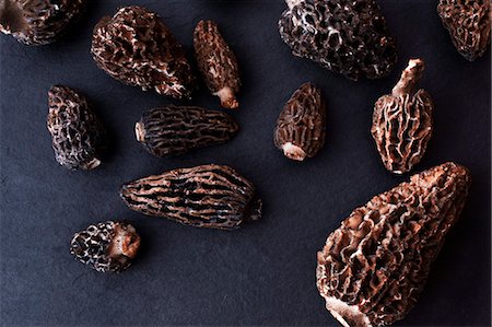 dried - Overhead view of dried morel mushrooms Stock Photo - Premium Royalty-Free, Code: 614-08120002