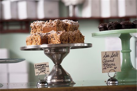 displaying chocolates - Vegan, allergy-friendly cakes on cakestand Stock Photo - Premium Royalty-Free, Code: 614-08148353