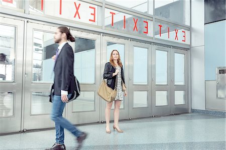 photographs of women walking away - Business people commuting at rush hour Stock Photo - Premium Royalty-Free, Code: 614-08148386