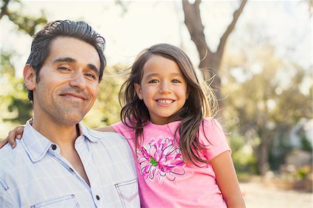 simsearch:614-08148597,k - Portrait of mid adult man and daughter in community garden Photographie de stock - Premium Libres de Droits, Code: 614-08148619