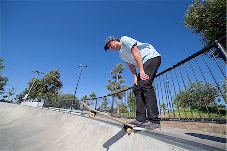 simsearch:614-09213744,k - Young man skateboarding in park, Eastvale, California, USA Stock Photo - Premium Royalty-Free, Code: 614-08202104