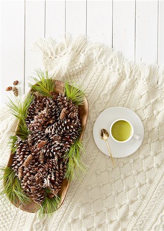delicious food table pictures white - Still life with pine cones and needles and cup of matcha tea Stock Photo - Premium Royalty-Free, Code: 614-08220162