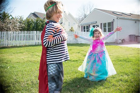 Children in costumes playing outdoors Stock Photo - Premium Royalty-Free, Code: 614-08270163