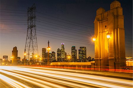simsearch:614-08329562,k - Light trails of traffic crossing 4th street bridge, illuminated at night, Los Angeles, California, USA Photographie de stock - Premium Libres de Droits, Code: 614-08329560