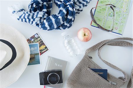 Overhead view of items being prepared for sightseeing on city break Stock Photo - Premium Royalty-Free, Code: 614-08392381