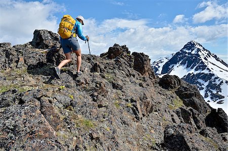 simsearch:614-06973793,k - Female mountain climber climbing uphill, rear view, Chugach State Park, Anchorage, Alaska, USA Stock Photo - Premium Royalty-Free, Code: 614-08392438