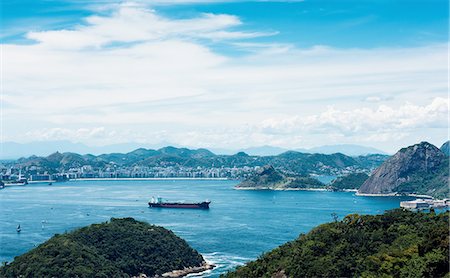 High angle view of ship sailing in bay, Niteroi, Rio De Janeiro, Brazil Stock Photo - Premium Royalty-Free, Code: 614-08392585