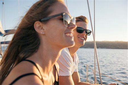 simsearch:614-08392689,k - Couple enjoying view on sailboat, San Diego Bay, California, USA Stock Photo - Premium Royalty-Free, Code: 614-08392664