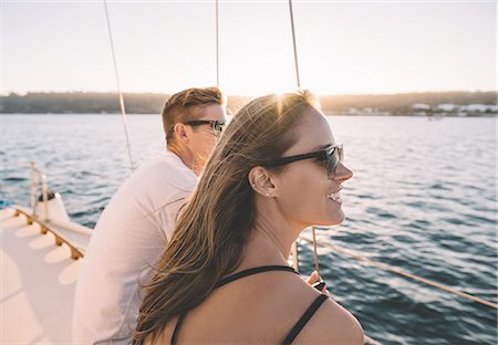 simsearch:614-08392689,k - Couple enjoying view on sailboat, San Diego Bay, California, USA Stock Photo - Premium Royalty-Free, Code: 614-08392670