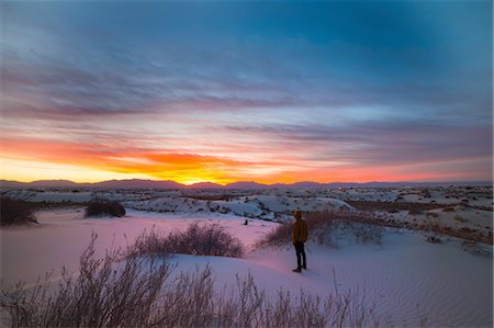 scenic new mexico - Young man standing, watching sunset, White Sands New Mexico Stock Photo - Premium Royalty-Free, Code: 614-08487838