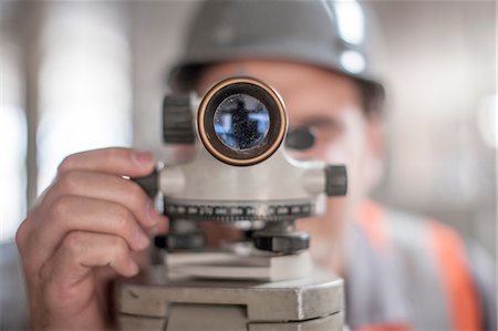 simsearch:614-06814021,k - Close up of young male surveyor looking through theodolite  on construction site Stockbilder - Premium RF Lizenzfrei, Bildnummer: 614-08488068